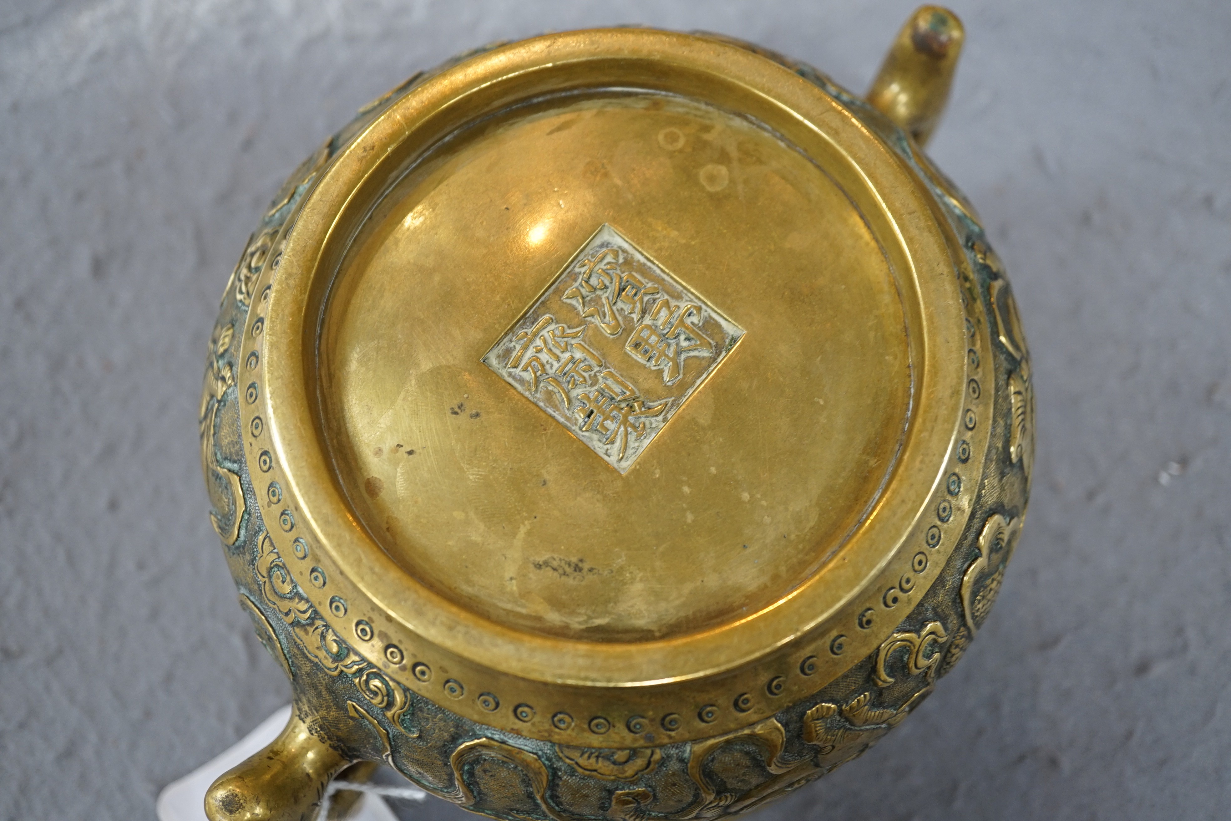 A Chinese polished bronze ‘Buddhist lion’ censer, gui, 19th century, 19.5cm wide, rim diameter 14cm